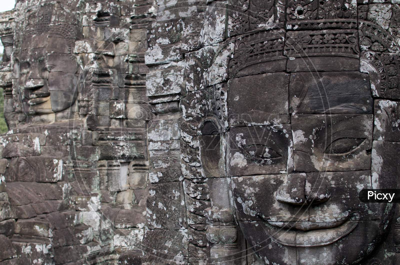 Smiling Stone Face At Bayon Temple In Cambodia