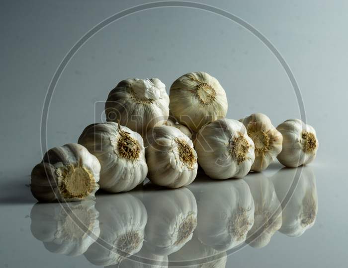 Group Of Raw Garlic On The Table