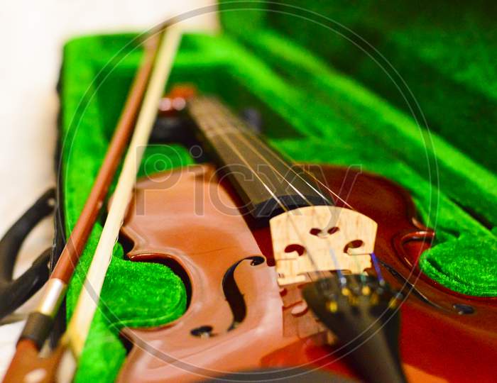 Close Up Shot Of A Violin,Very Soft Def Of Field. Blur Photo