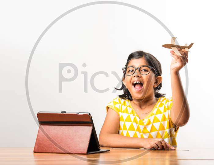 Cute Little Indian Girl Making Paper Plane, Aeroplane For Science Project With Online Tutorial