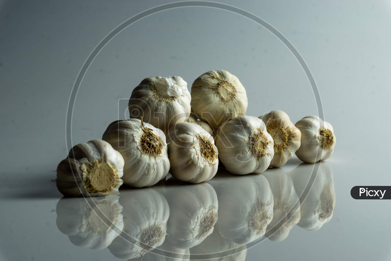 Group Of Raw Garlic On The Table