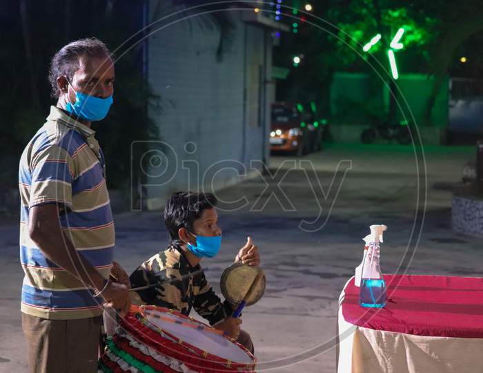 Drummer playing on the occasion of Durga Puja