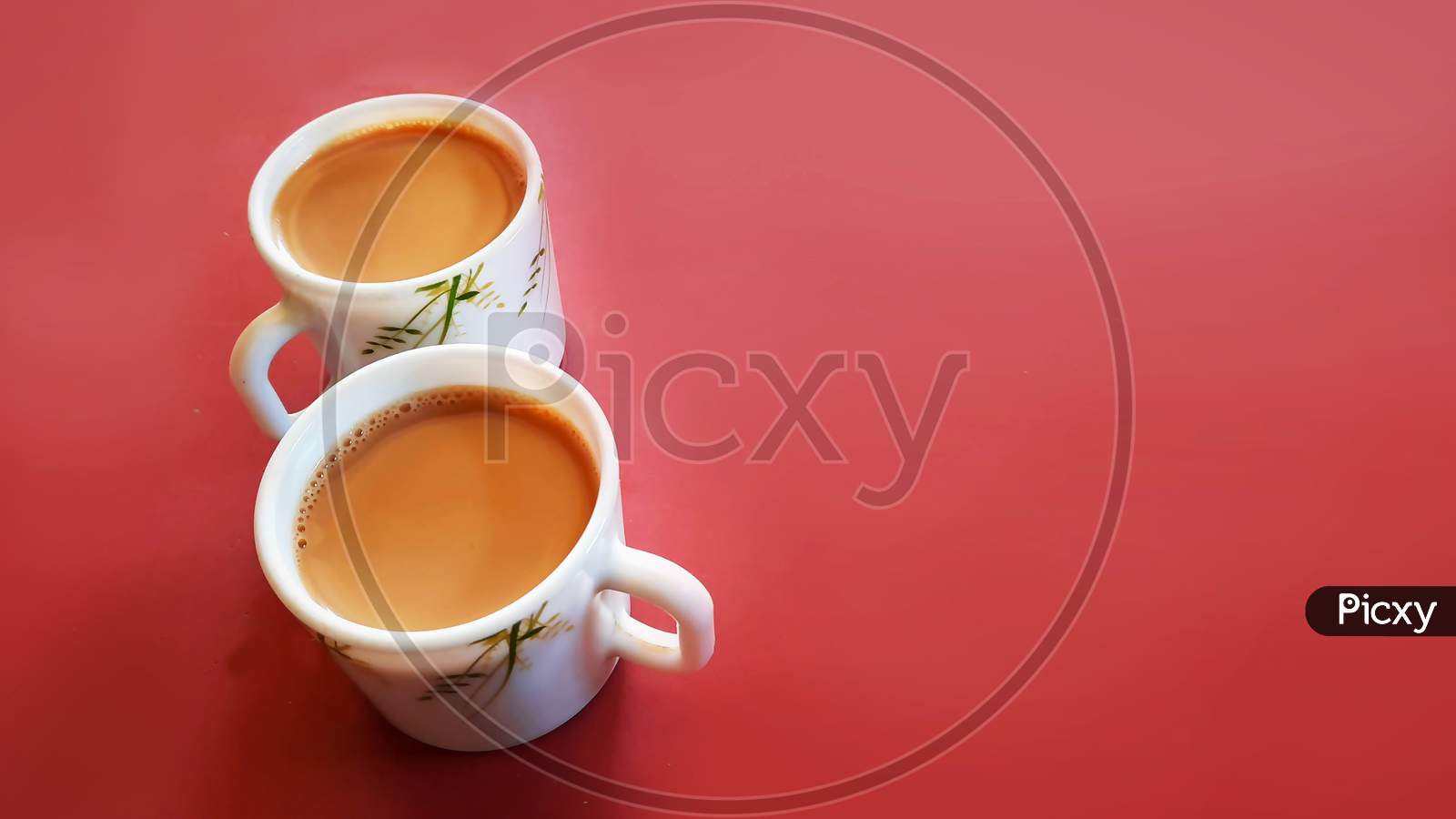 Indian Tea Or Chai In Ceramic Cups Isolated In Clean Background