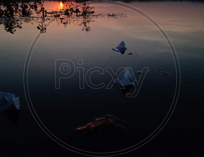 Paper Boat Floating Water Sunset