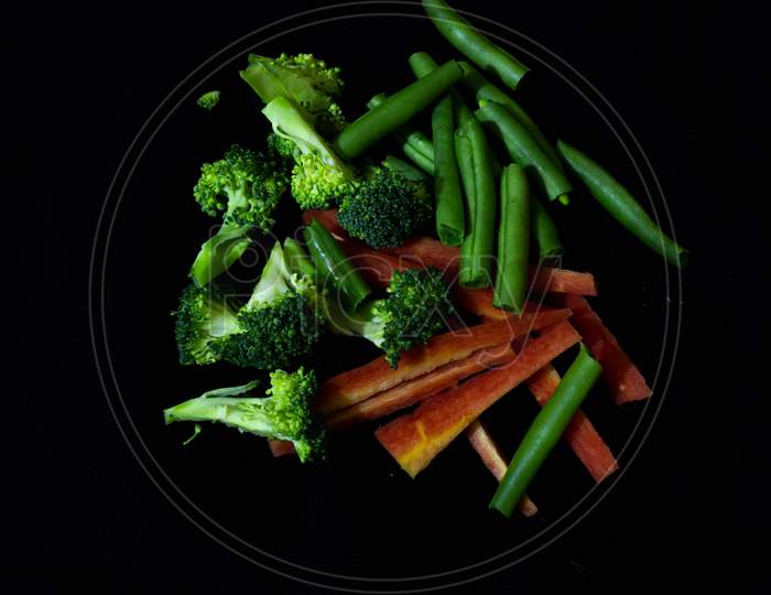 Broccoli, french beans, carrot slices