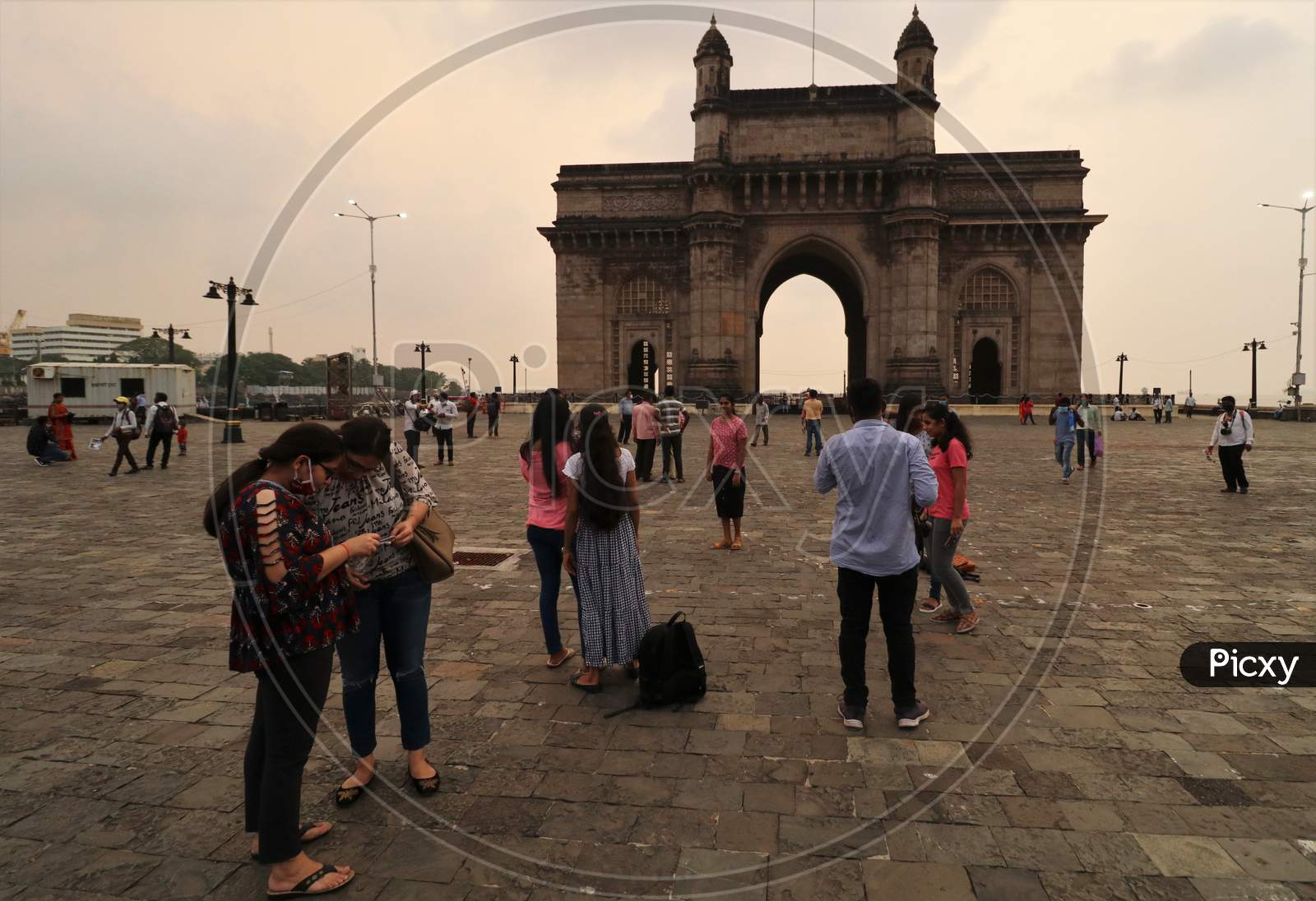 People visit the Gateway of India, after it was reopened for public, amidst the spread of the coronavirus disease (COVID-19) in Mumbai, India, October, 2020.
