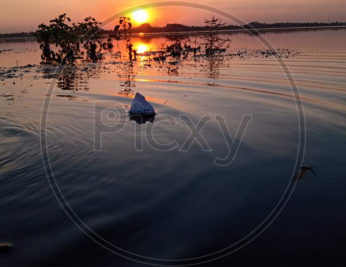 Paper Boat Floating Water Sunset