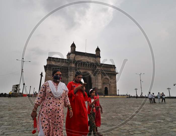People visit the Gateway of India, after it was reopened for public, amidst the spread of the coronavirus disease (COVID-19) in Mumbai, India, October, 2020.