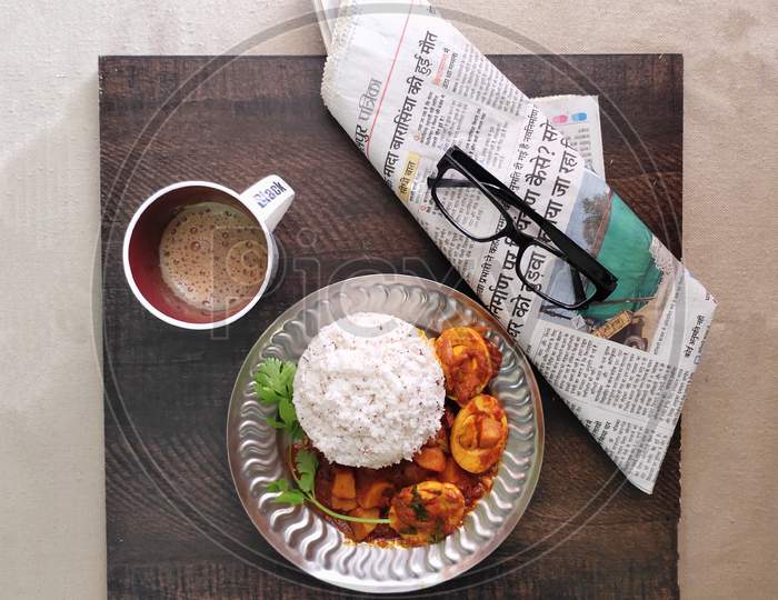 Riceputtu and Eggcurry with chai