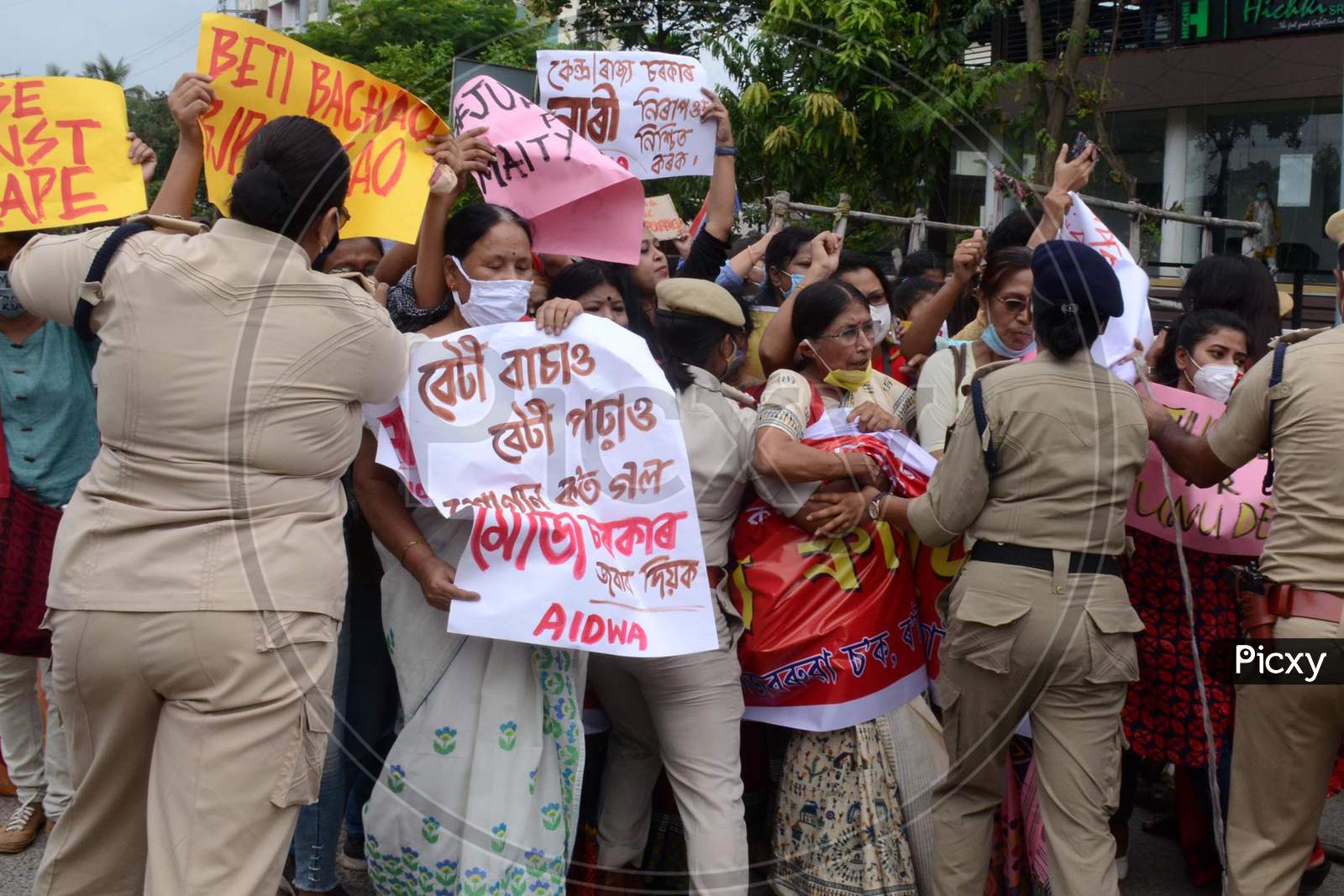 Activist of All India Democratic Women's Association (AIDWA) shout slogans  during a protest demanding justice for the death of a Dalit woman after an alleged gang rape in Uttar Pradesh  Hathras in Guwahati on Saturday.