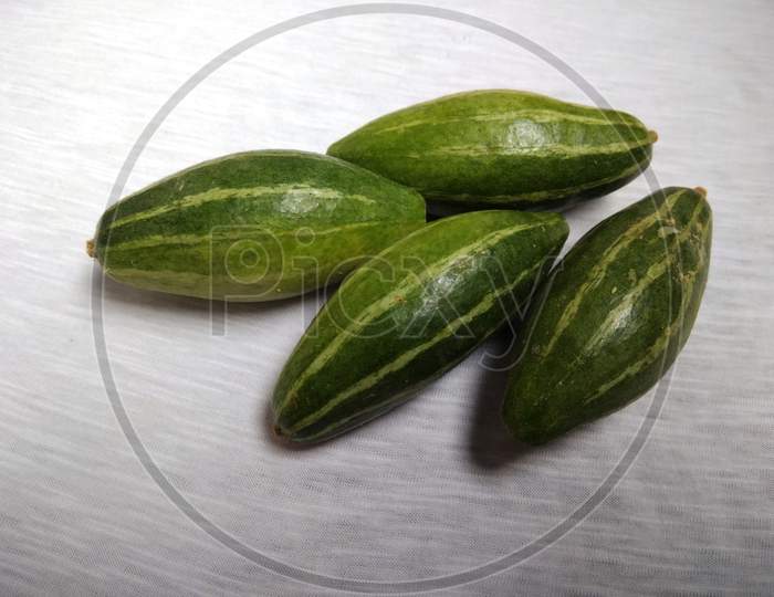Pointed Gourd or parwal is a green, thin skinned vegetable that has a mild taste and edible crunchy seeds. Popularly used with potato in vegetables, it is also cooked by stuffing with spices