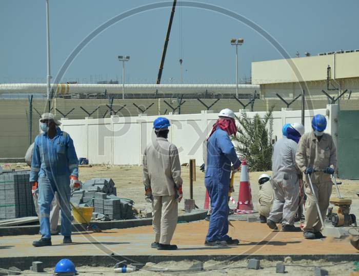 Construction Workers Digging Trench Using Shovels. Abu Dhabi,Uae.03.10.2020.