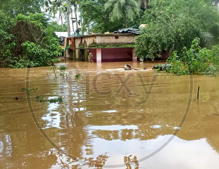 House surrounded by water in flood in Odisha