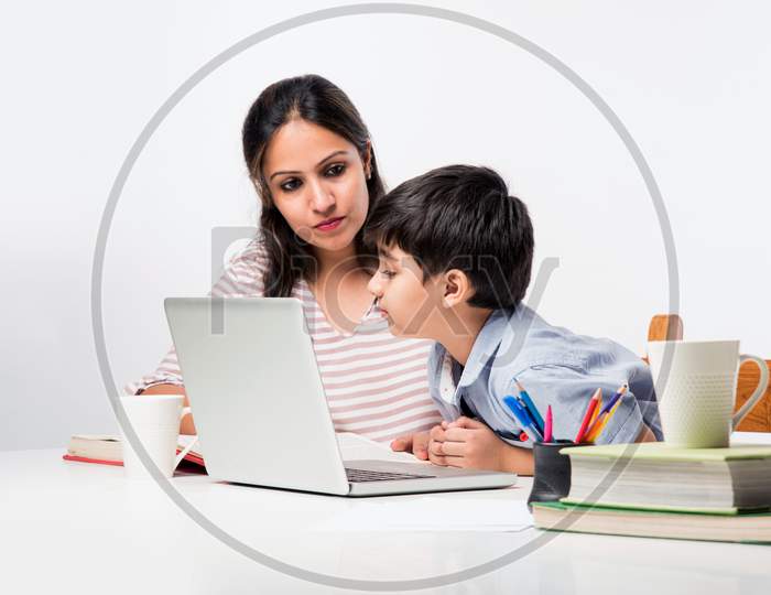 Online School In India Concept - Cute Little Son Taking Mother'S Help In Studies Or Homework