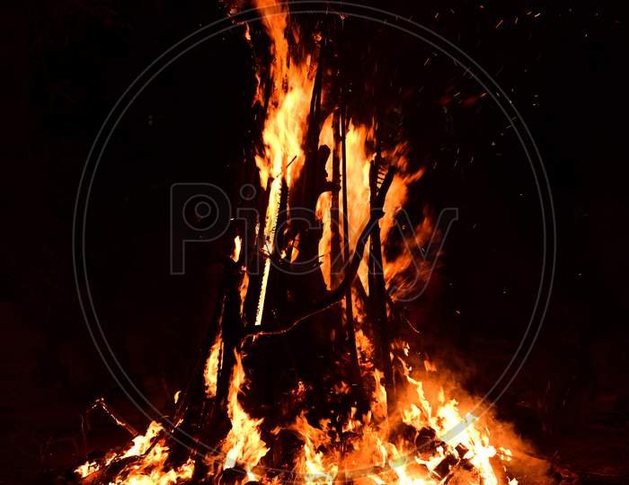 Isolated Image Of A Bonfire With Speckles Of Flames Blowing In The Air