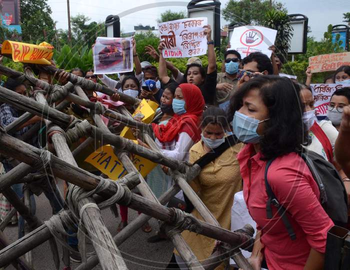 Activist of All India Democratic Women's Association (AIDWA) shout slogans  during a protest demanding justice for the death of a Dalit woman after an alleged gang rape in Uttar Pradesh  Hathras in Guwahati on Saturday.