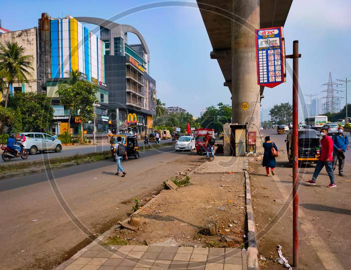 Vanarai bus stop near Hub mall at Western express Highway,  Goregaon East.