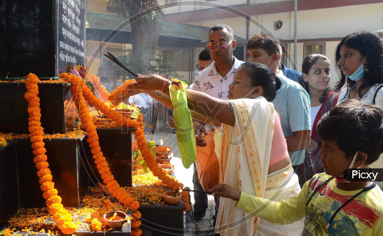 Family members pay tribute to the victims of October 30, 2008, serial bomb blasts on its twelve anniversaries at CJM court premises, in Guwahati, Friday, October 30, 2020.