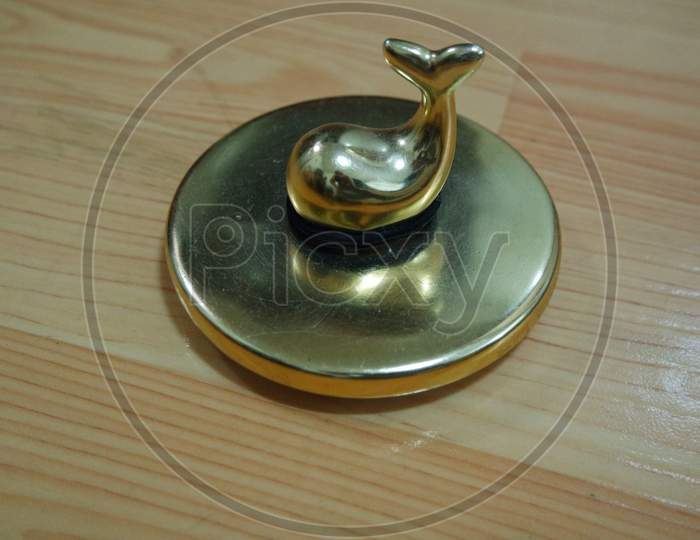 The Decorative Little Golden Pot With Dolphin Lid Open, For Room Decoration