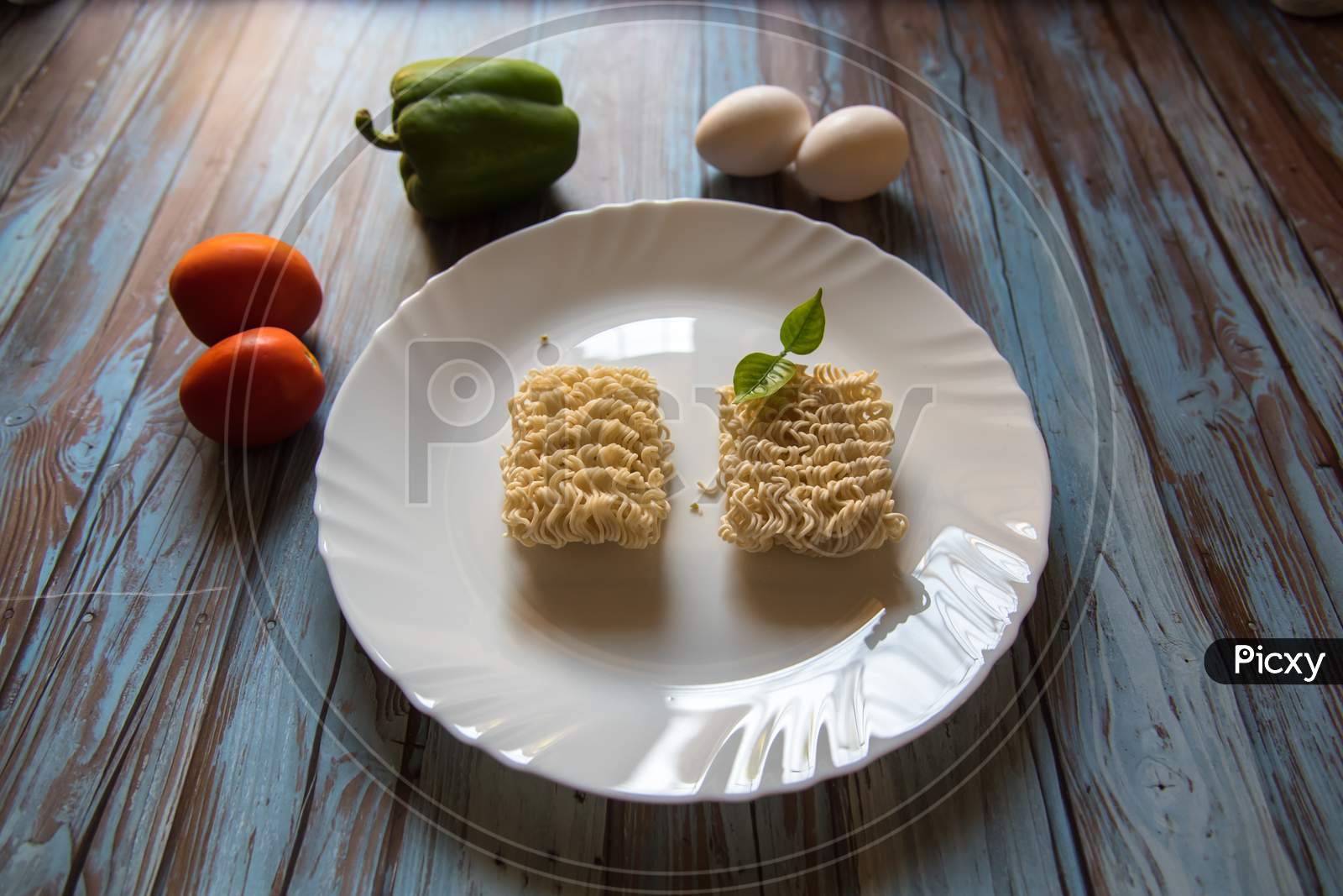Raw instant noodles with condiments.
