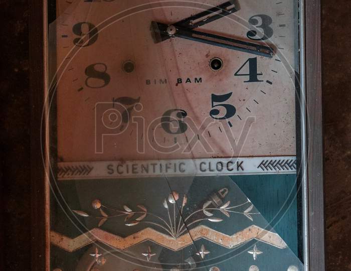 Old and broken clock, scientific clock