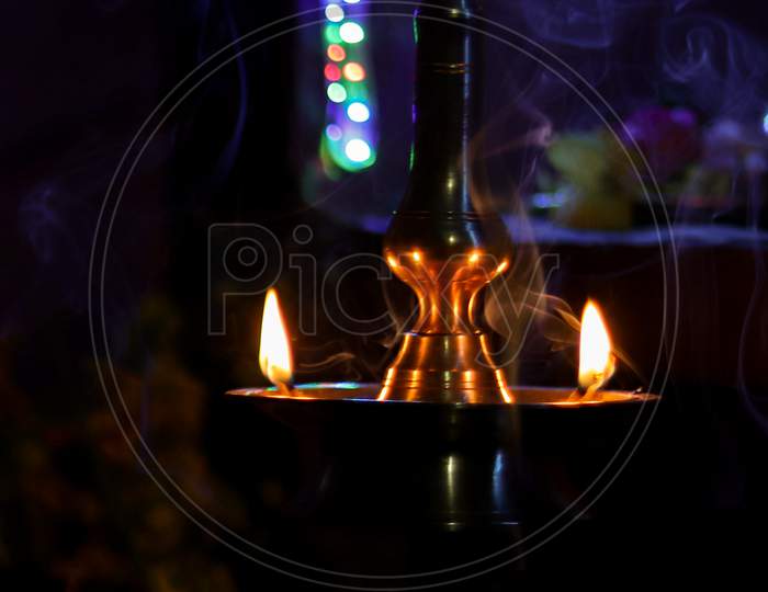 Traditional South Indian Brass Oil Lamp 'Nilavilakku '. During Events Like Housewarming, Marriage Etc., The Nilavilakku Is Lighted Before Starting The Rituals.