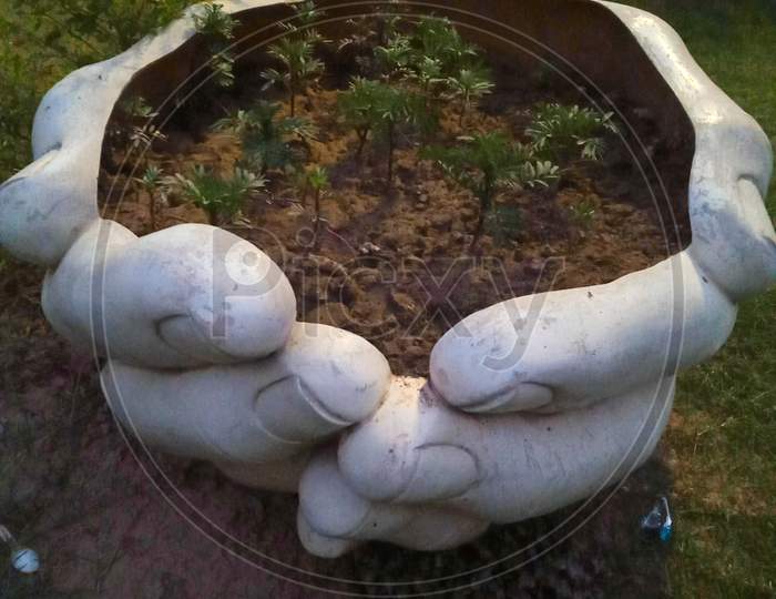 Ceramic Hand Shaped Garden Pot With Small Plants