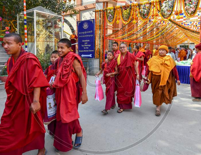 Buddhist Monks receive Dana