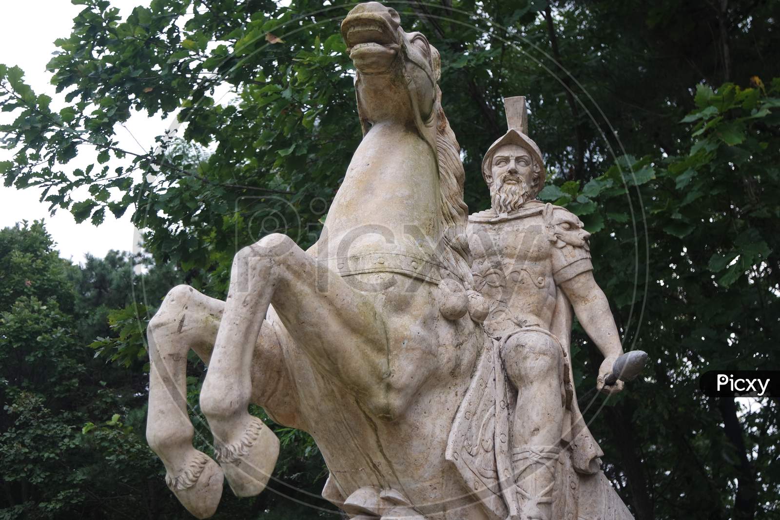 White Marble Statue Of An Ancient Man Holding A Scroll And Riding A Horse