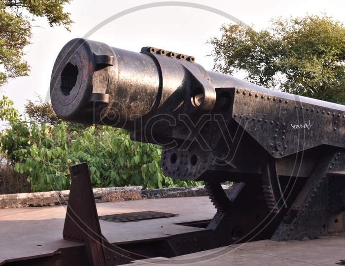 Closeup View Of A Old Cannon Placed On Top Of A Island