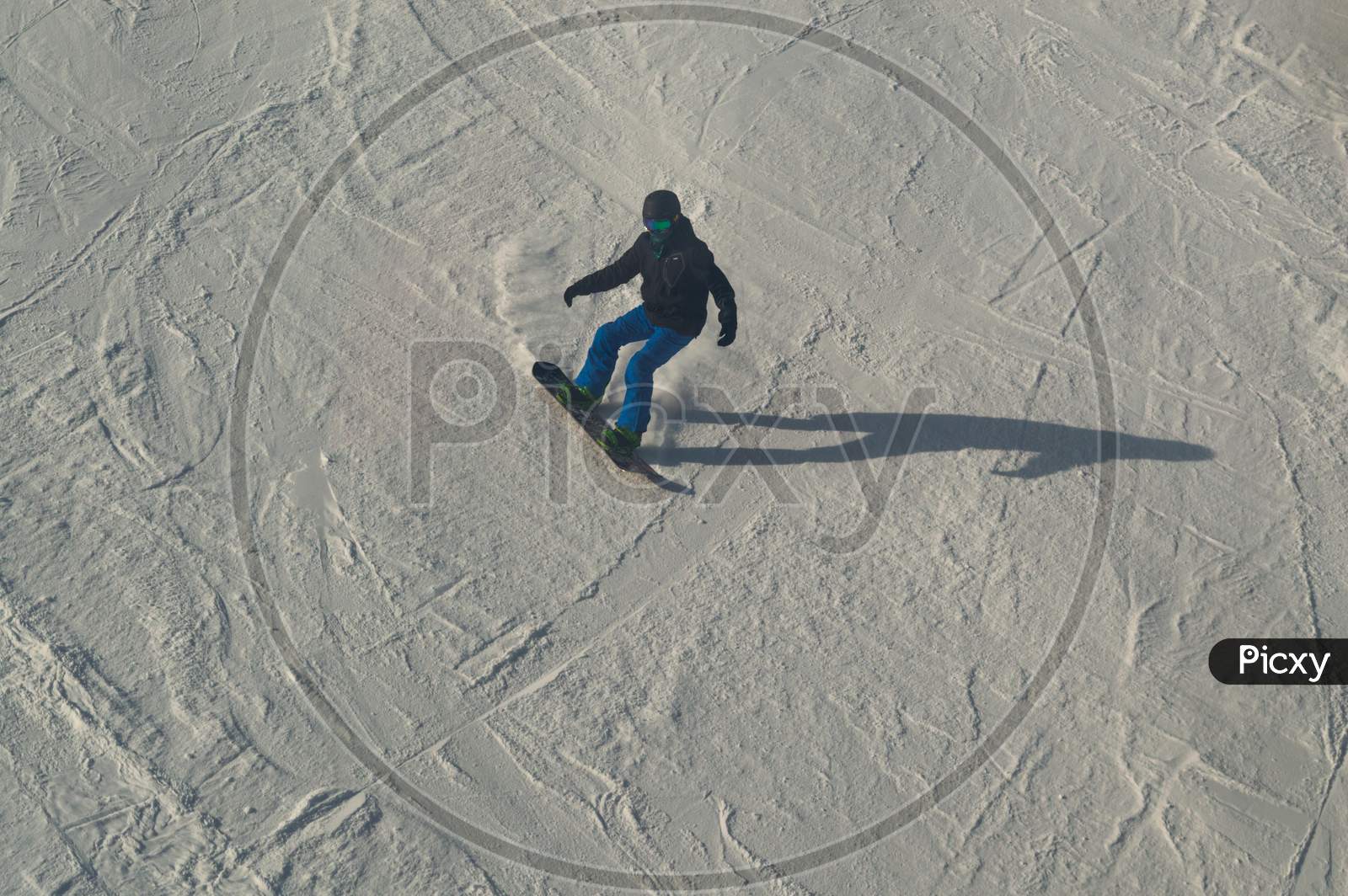 Snowboarder At Genting Olympic Resort In Zhangjiakou, China