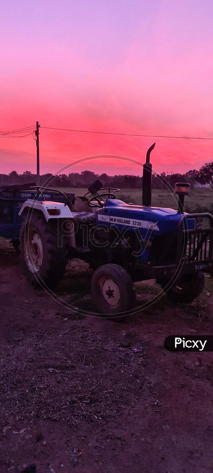 Sunset with tractor