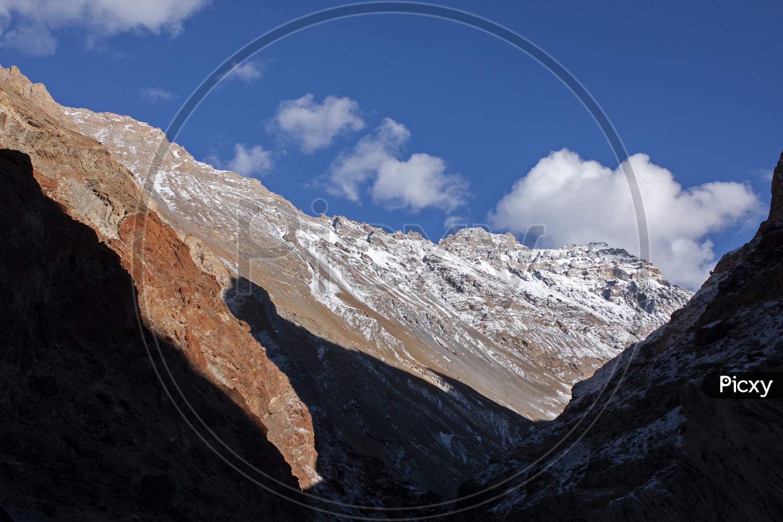 High Altitude Peaks And Its Shadow In A Cold Sunny Day In The Himalaya In Ladakh