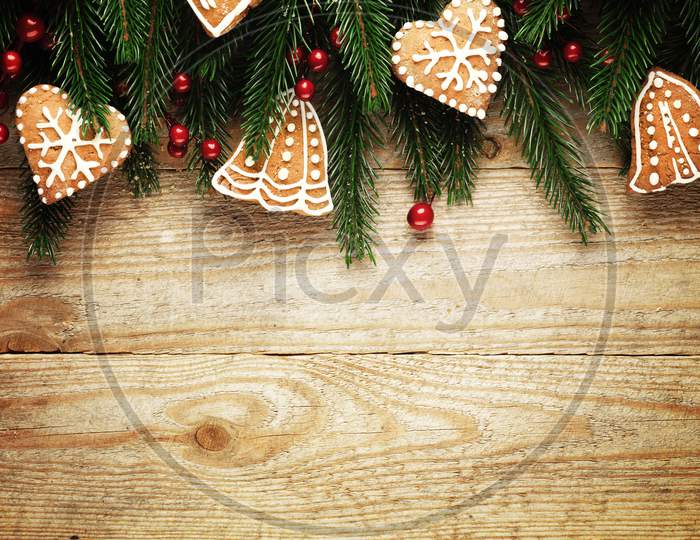 Christmas Fir Tree With Decoration On A Wooden Board