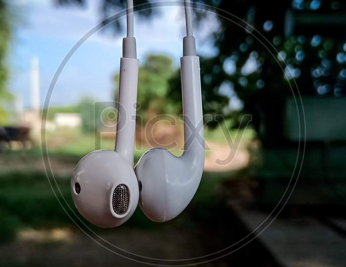 Earphone hanging image with blur background