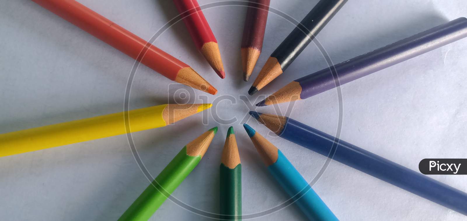 Multi coloured pencils circle