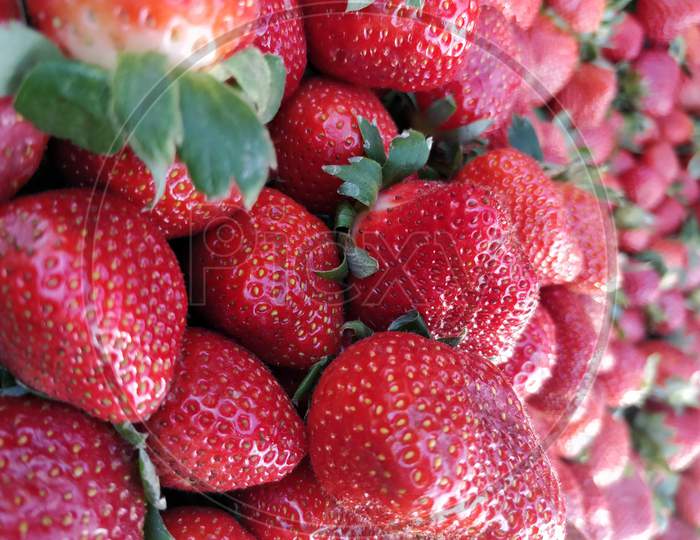 Close-up of fresh strawberries for sale on Indian street market