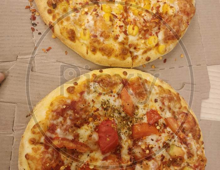 Closeup of Organic pizza with vegetables and cheese