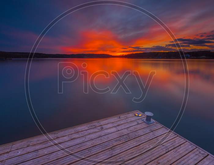 Beautiful Long Exposure Lake At Sunset Landscape.