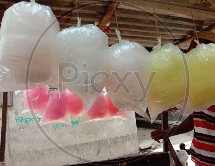 Pink And White And Yellow Colored Cotton Candy Stock