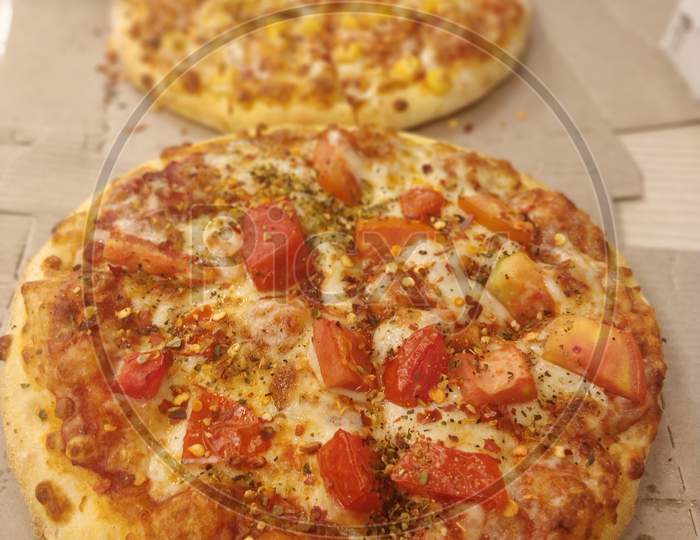 Closeup of Organic pizza with vegetables and cheese
