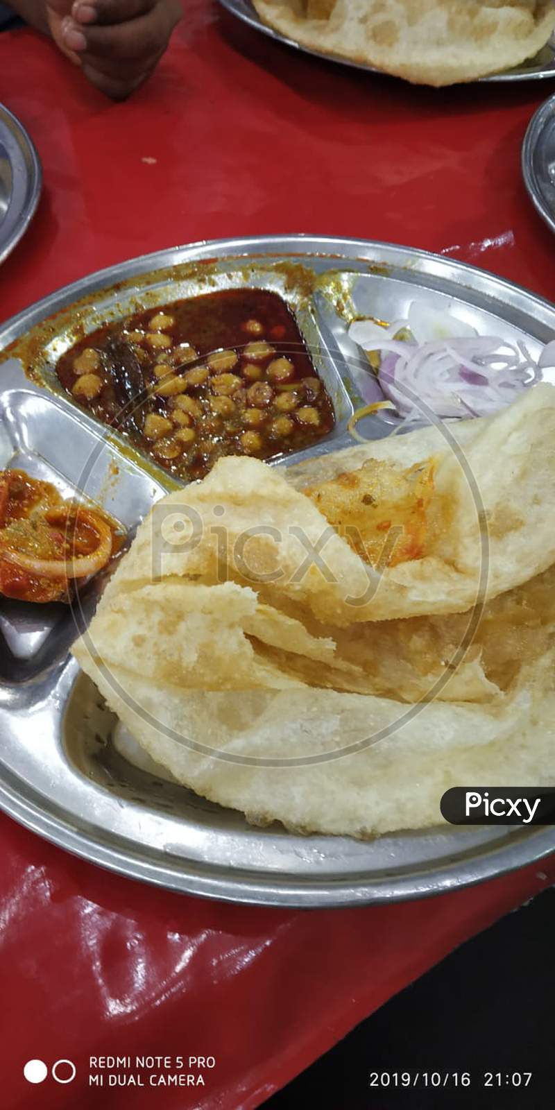 Indian Street food chole bhatoore, chola bhatoora