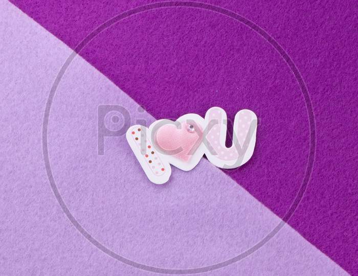 I Love You In Pink And White On Diagonal Purple And Lilac Background