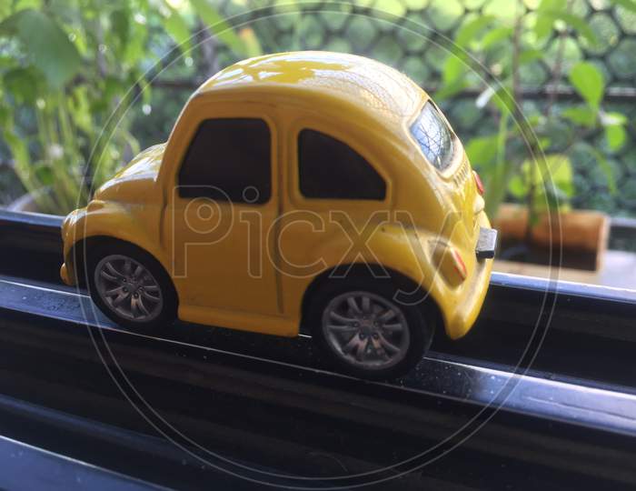 Yellow beetle car indoor photography