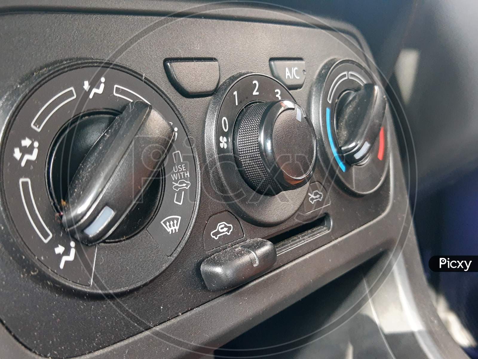Details And Controls Of Modern Car - Close Up Instrument Automobile Panel With Climat Control View With Air Conditioning Buttons