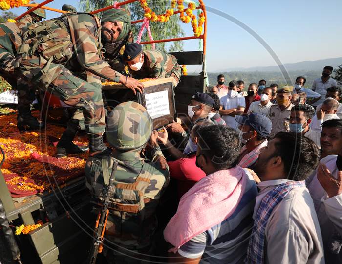 Body of Army JCO Sukhdev Singh arriving at his Peoni village of Udhampur district for last rites on Tuesday. The JCO lost his life in Pakistani firing along the LoC in Nowshera sector of Rajouri district on Monday.
