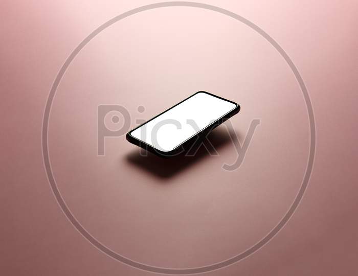 Minimalistic Mock Up Flat Image Design With A Floating Mobile Phone With Copy Space And White Scree To Write Over It Over A Flat Pastel Pink Background