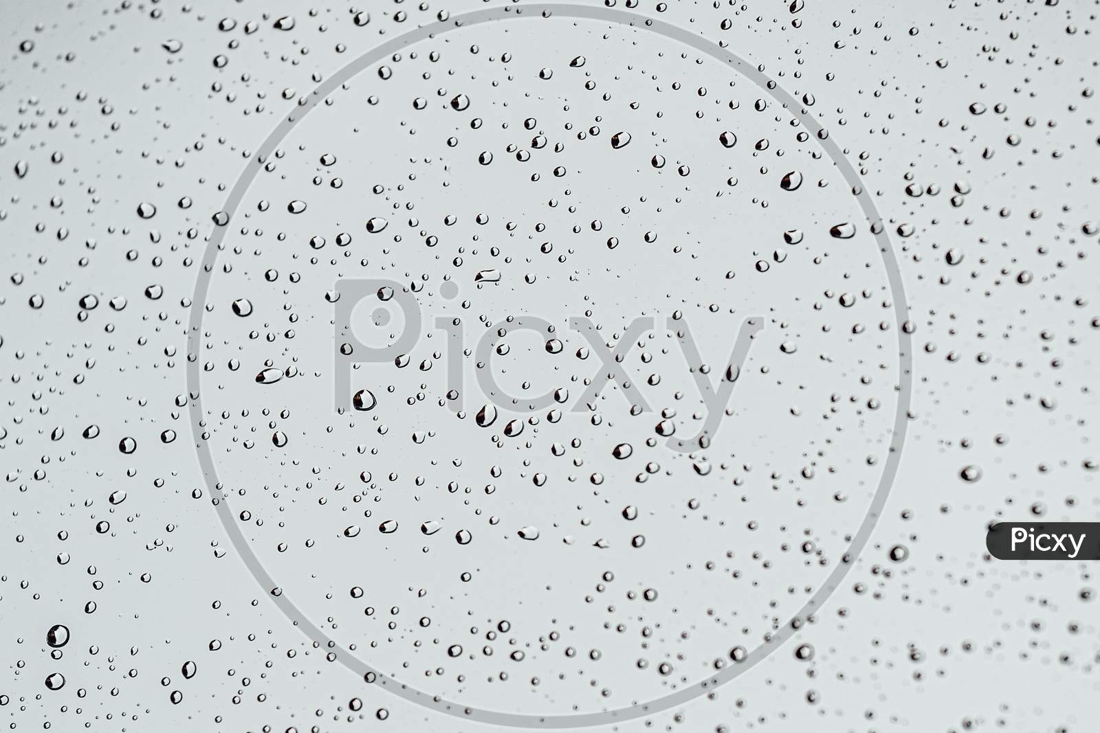 Super Minimalistic White Background Of Rain Drops Over A Crystal With Super Texture And Sharp Drops