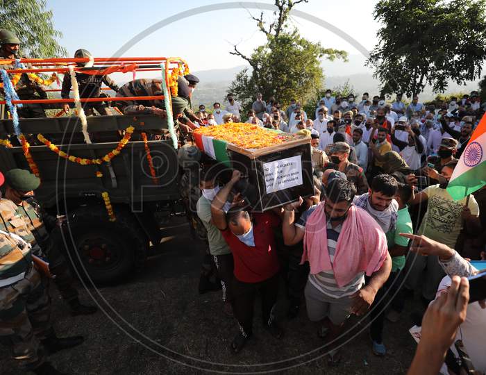 Body of Army JCO Sukhdev Singh arriving at his Peoni village of Udhampur district for last rites on Tuesday. The JCO lost his life in Pakistani firing along the LoC in Nowshera sector of Rajouri district on Monday.