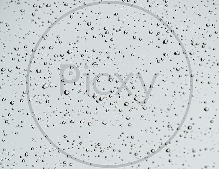 Super Minimalistic White Background Of Rain Drops Over A Crystal With Super Texture And Sharp Drops